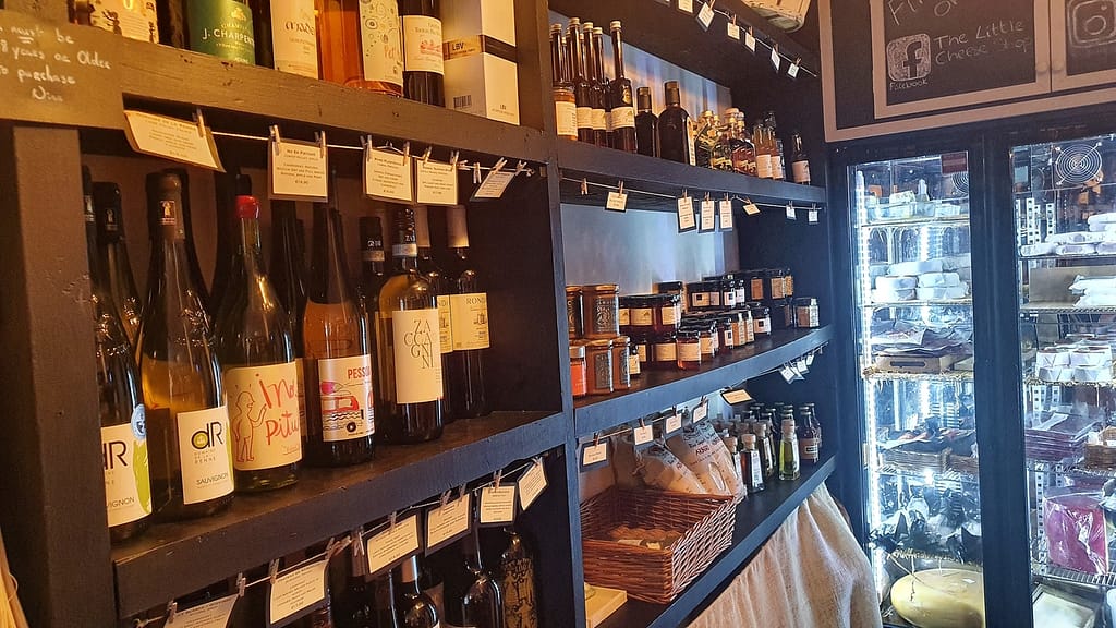 The Little Cheese Shop offers a delicious selection of flavored vinegars, olive oils and more