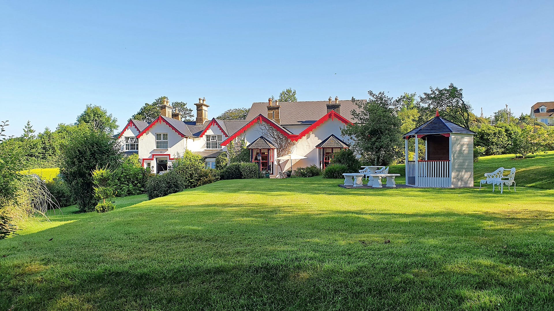 A view of the Killeen House Hotel's gardens and gazebo.
